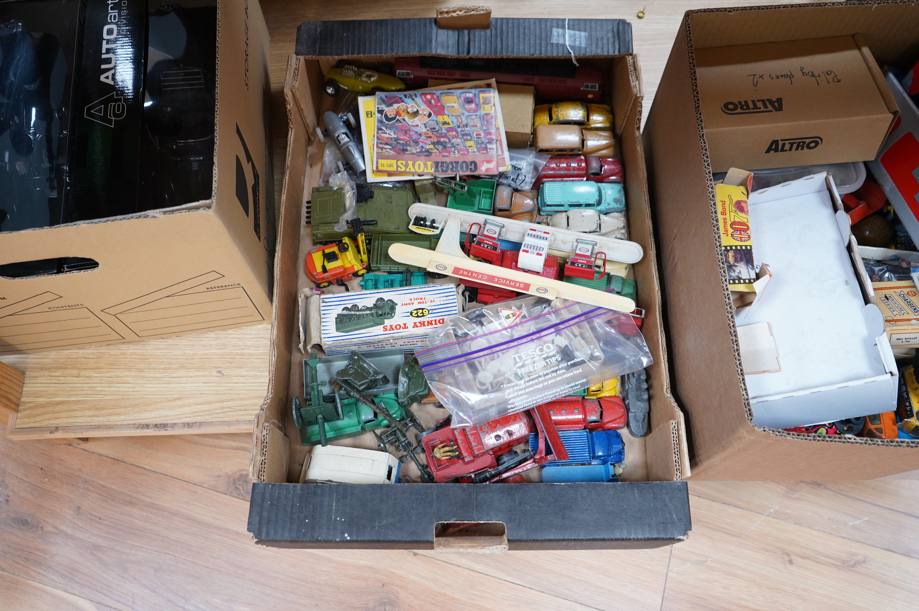 A collection diecast vehicles, lead figures, tinplate, etc. by Dinky Toys, Corgi Toys, Matchbox Series, etc. including; twenty 1950s/60s Dinky Toys, twelve Corgi Toys, two Matchbox Series Collectors Cases (41), both with